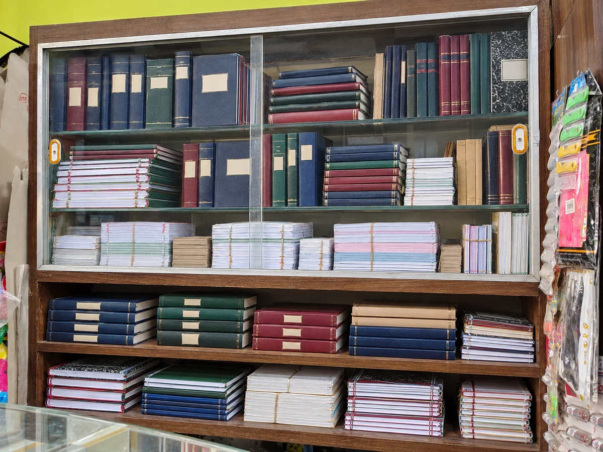 AI concept of a proposed fuller display of bound registers and bundled forms; not a photograph of current inventory.